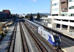 Caltrans owned SC-44 # 2103 shoves Amtrak Capitol Corridor Train # 540 out of Emeryville Station 